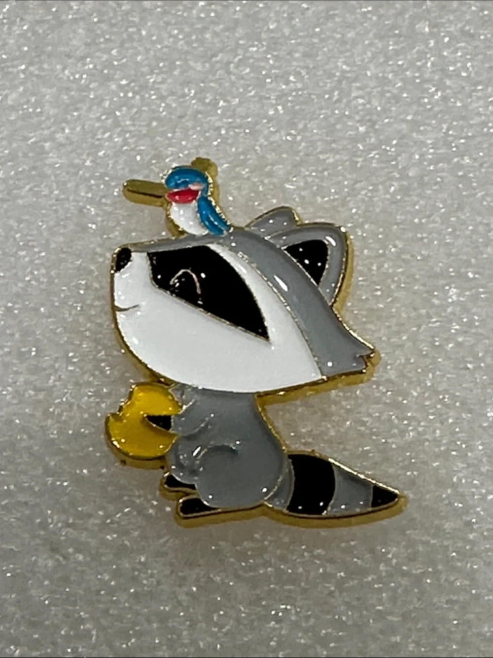 Cute Raccoon Enamel Pin with Bird and Acorn - Gray, White, Black, Yellow, Blue